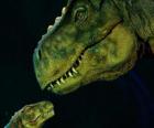 Мать динозавр нежно глядя на ее маленькую